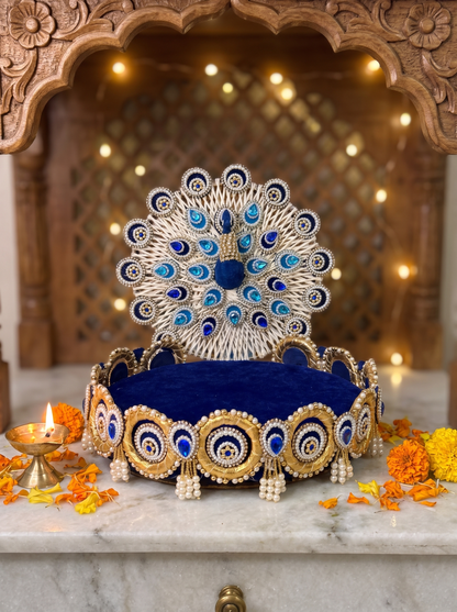 Royal blue velvet peacock singhasan for Laddu Gopal, front view in a festive mandir setting