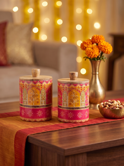 Wooden canister jars with lids in pink and saffron Mughal arch print, set of 2, front view