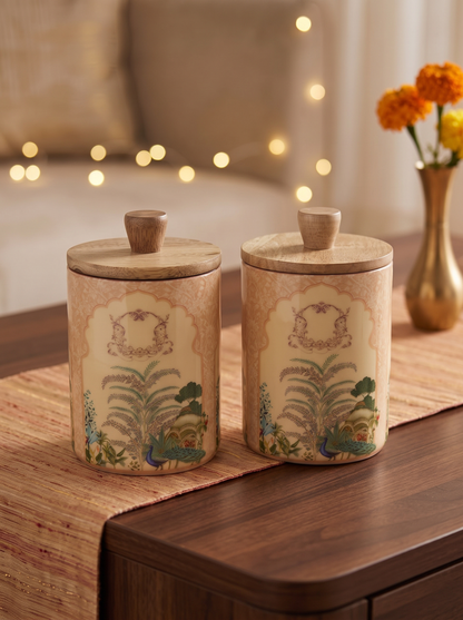 Cream wooden canister jars with lids and Mughal garden print, set of 2, front view in a festive setting