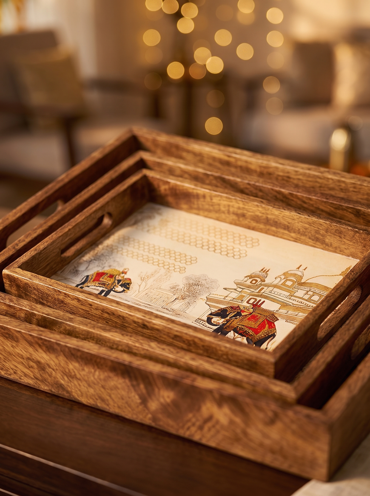 Close-up detail of Mughal elephant and palace artwork on sheesham wood tray