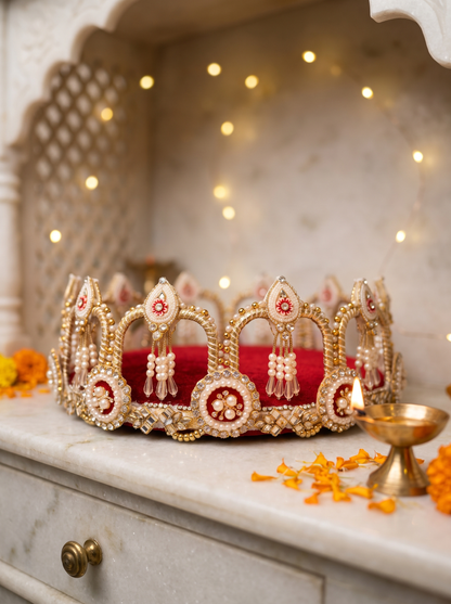 Maroon velvet pooja thali for Diwali and Karva Chauth, angled view with diyas and marigolds