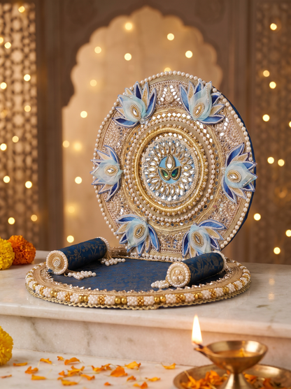 Blue lotus round-back singhasan for Krishna idol, angled view with diyas and marigolds