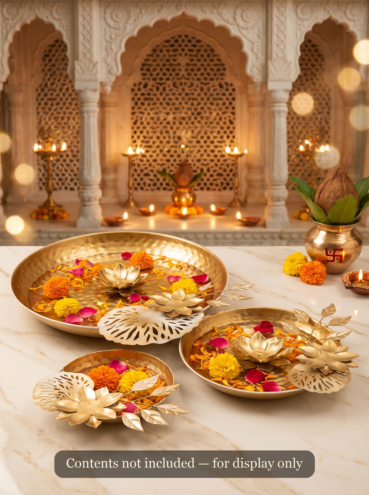 Gold lotus bowl set styled with petals and lit tealights as a Diwali table centerpiece