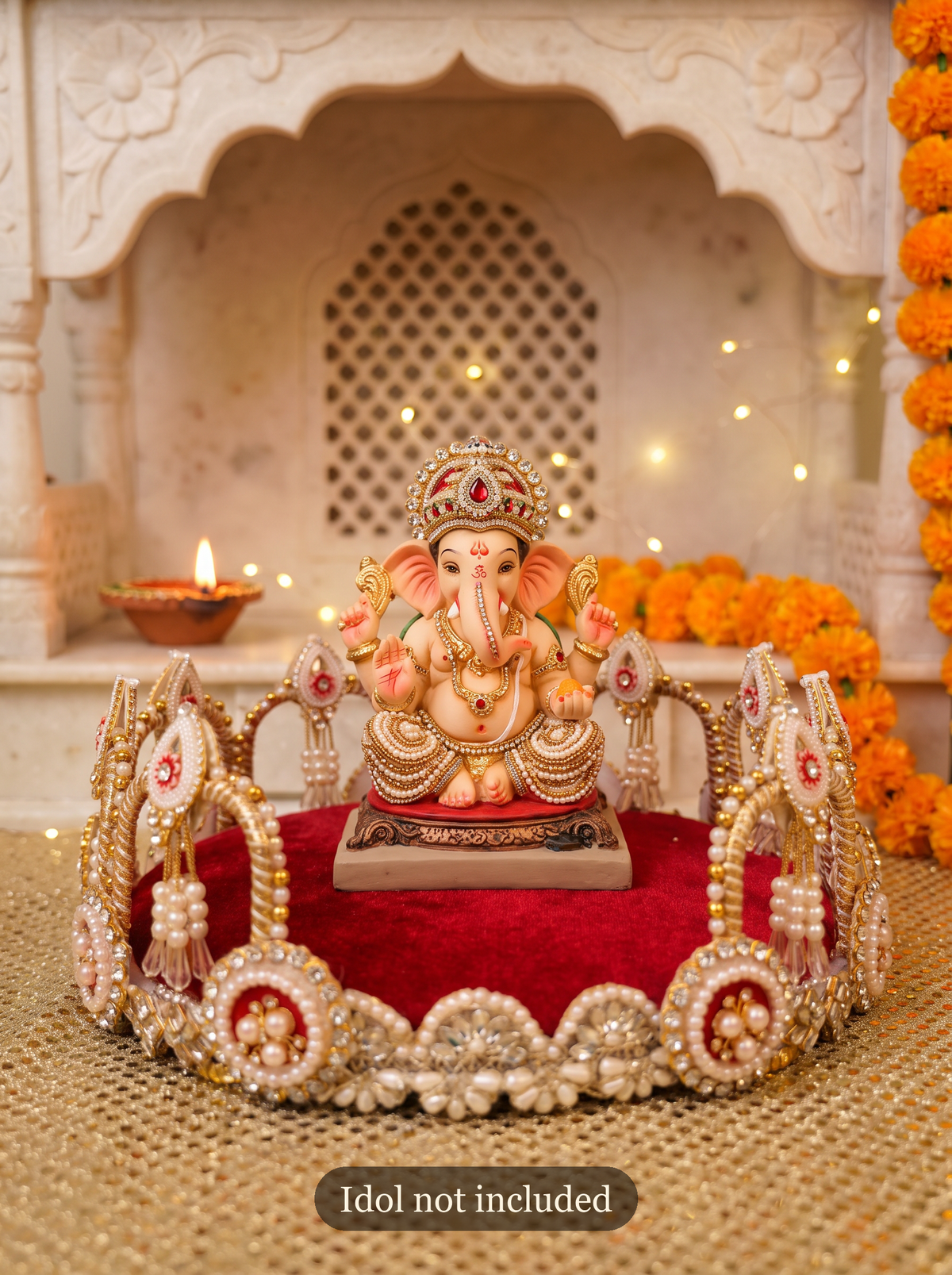 Maroon velvet puja thali styled with a Ganesha idol for Diwali (idol not included)