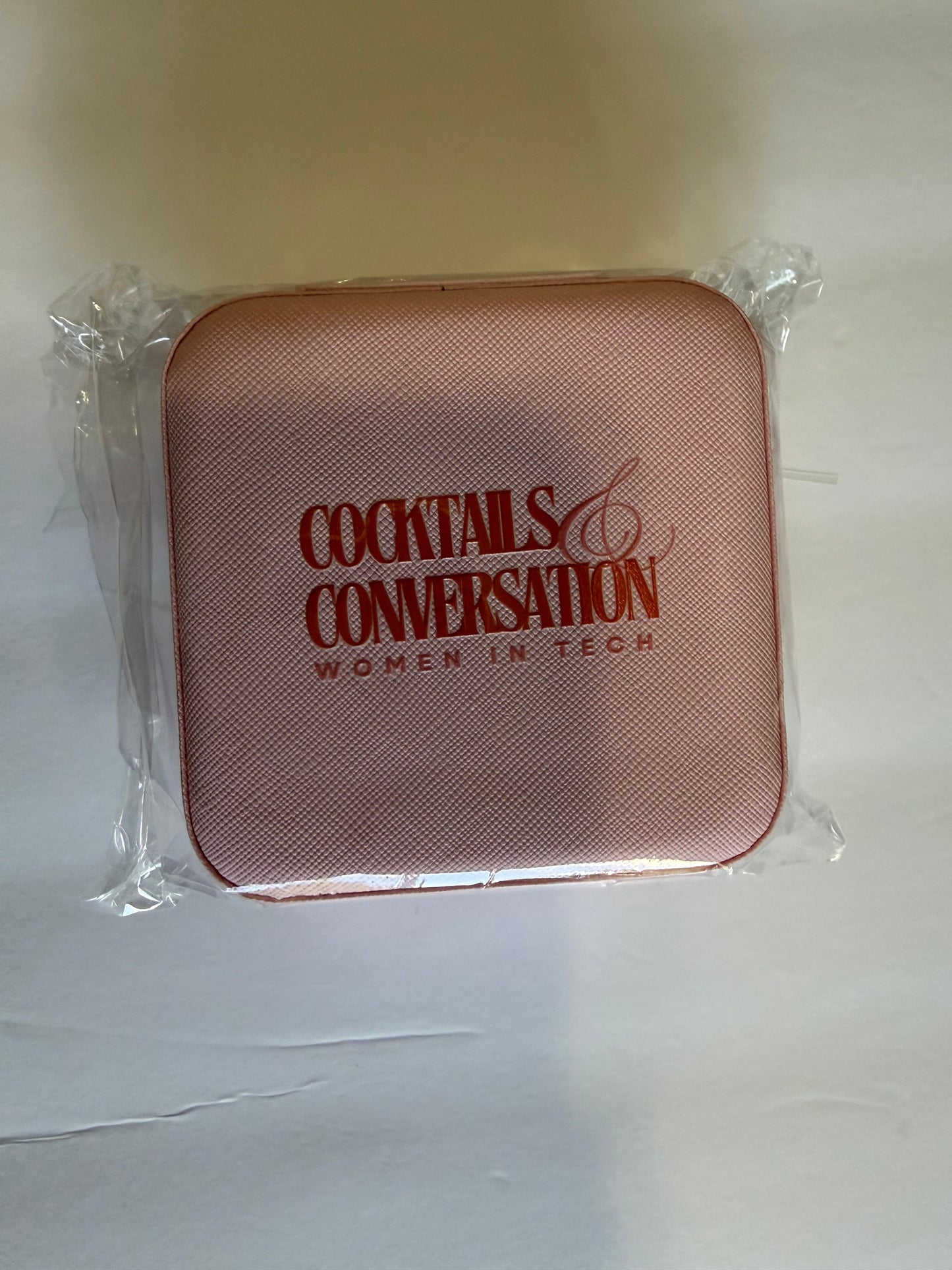 Cocktails & Conversation blush jewelry pouch