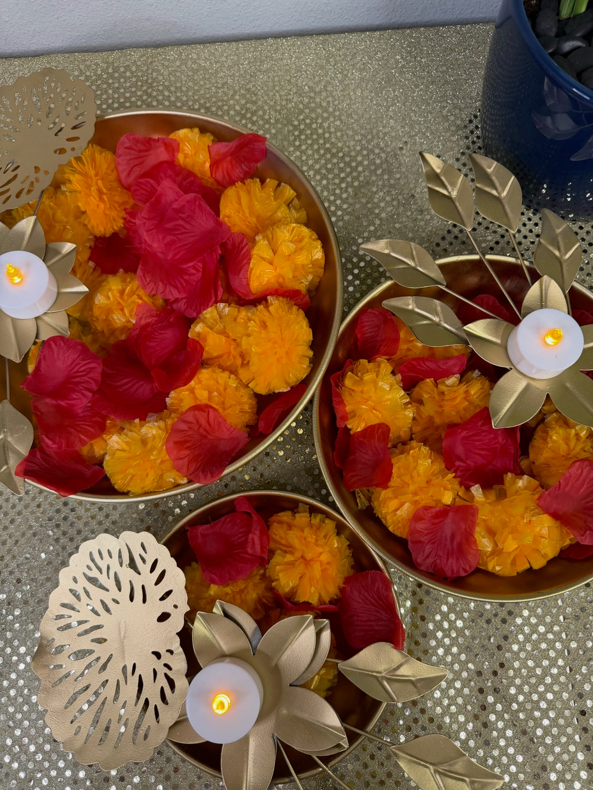 Gold lotus bowl and leaf tealight holder set, overhead view