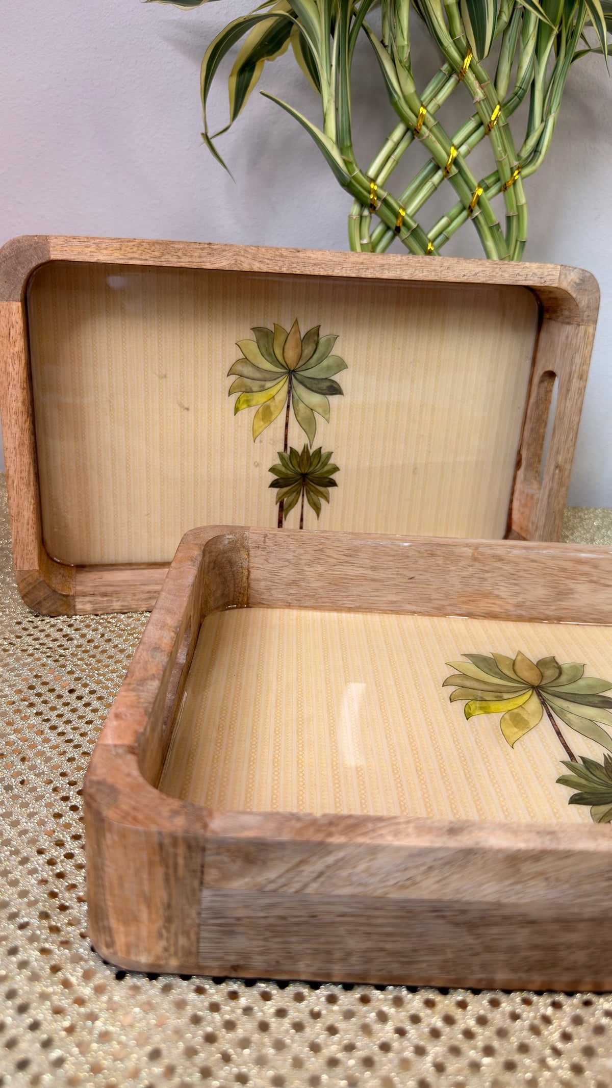 Close-up of palm tree motif on whitewashed mango wood tray