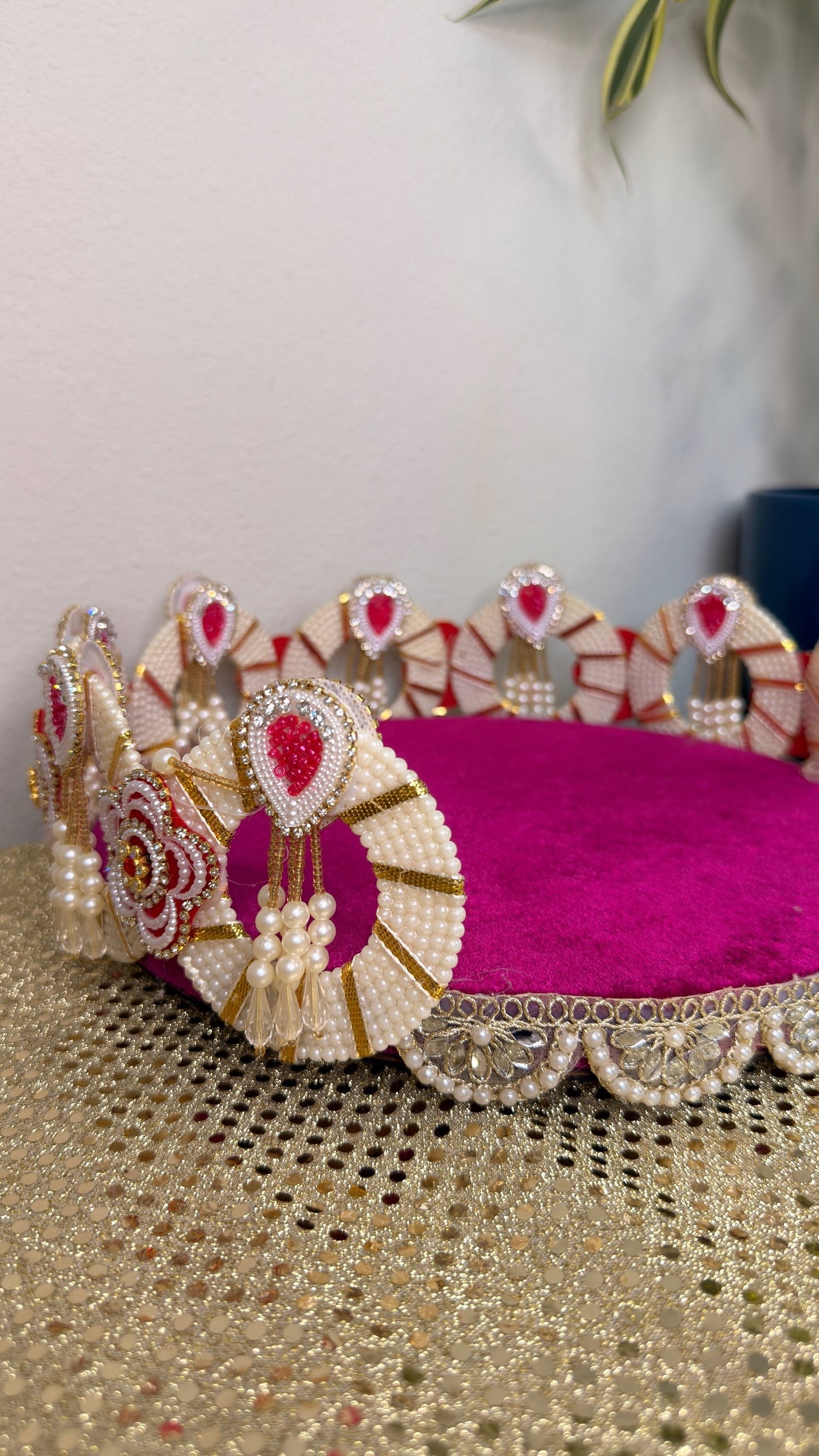 Magenta velvet kundan thali for wedding and Diwali decor, angled detail