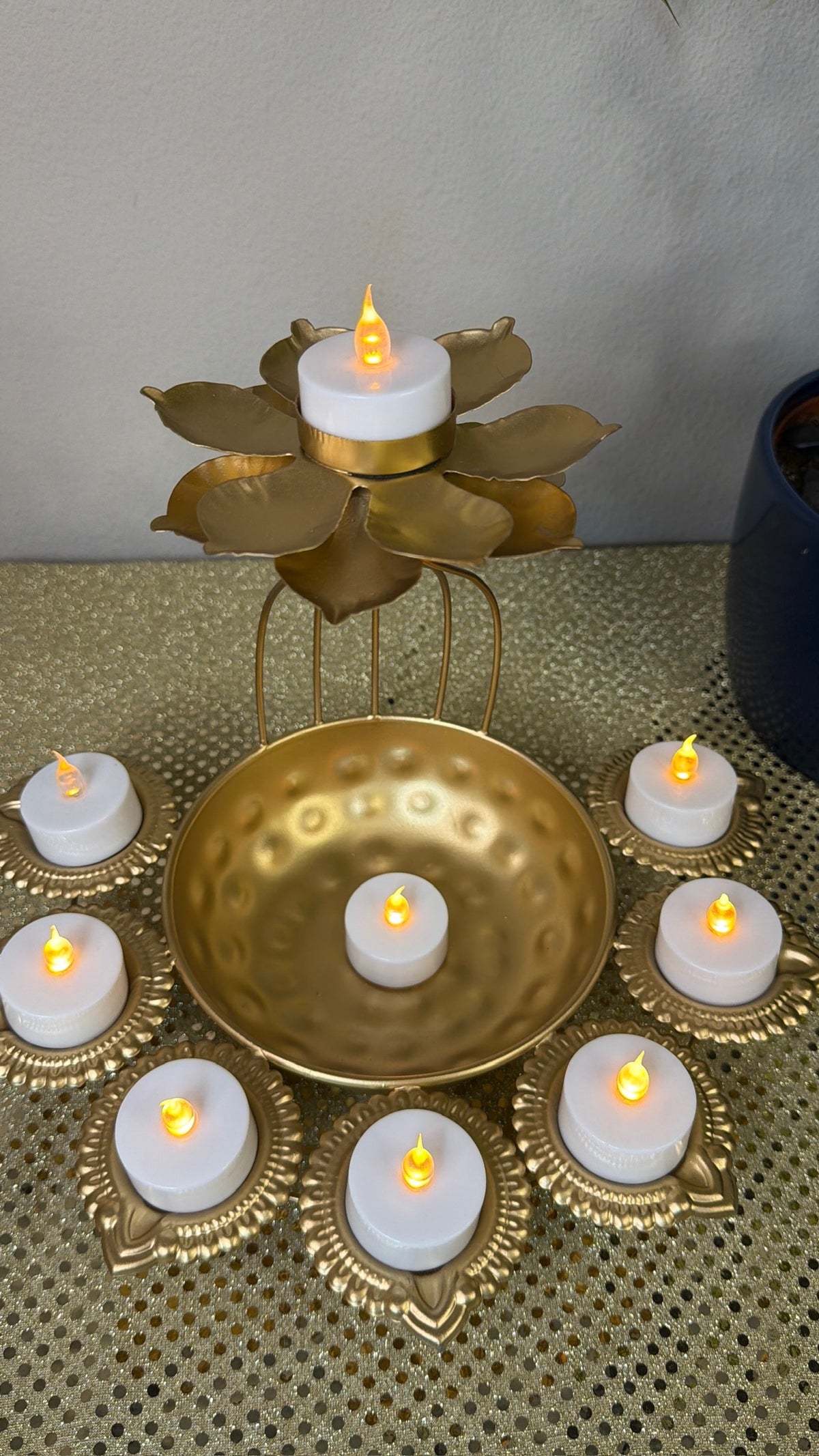 Gold wire-cage lotus diya with hammered bowl and seven tealight diya cups, Diwali set