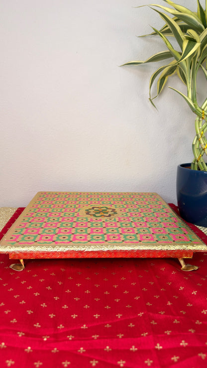 Pink and green checkered brocade puja chowki, square bajot with gold feet for Diwali puja