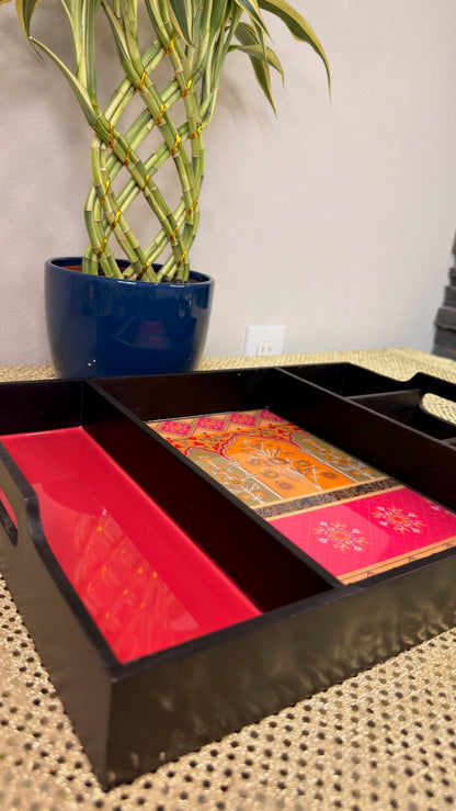 Black lacquered Diwali hamper tray with brocade lining, angled view