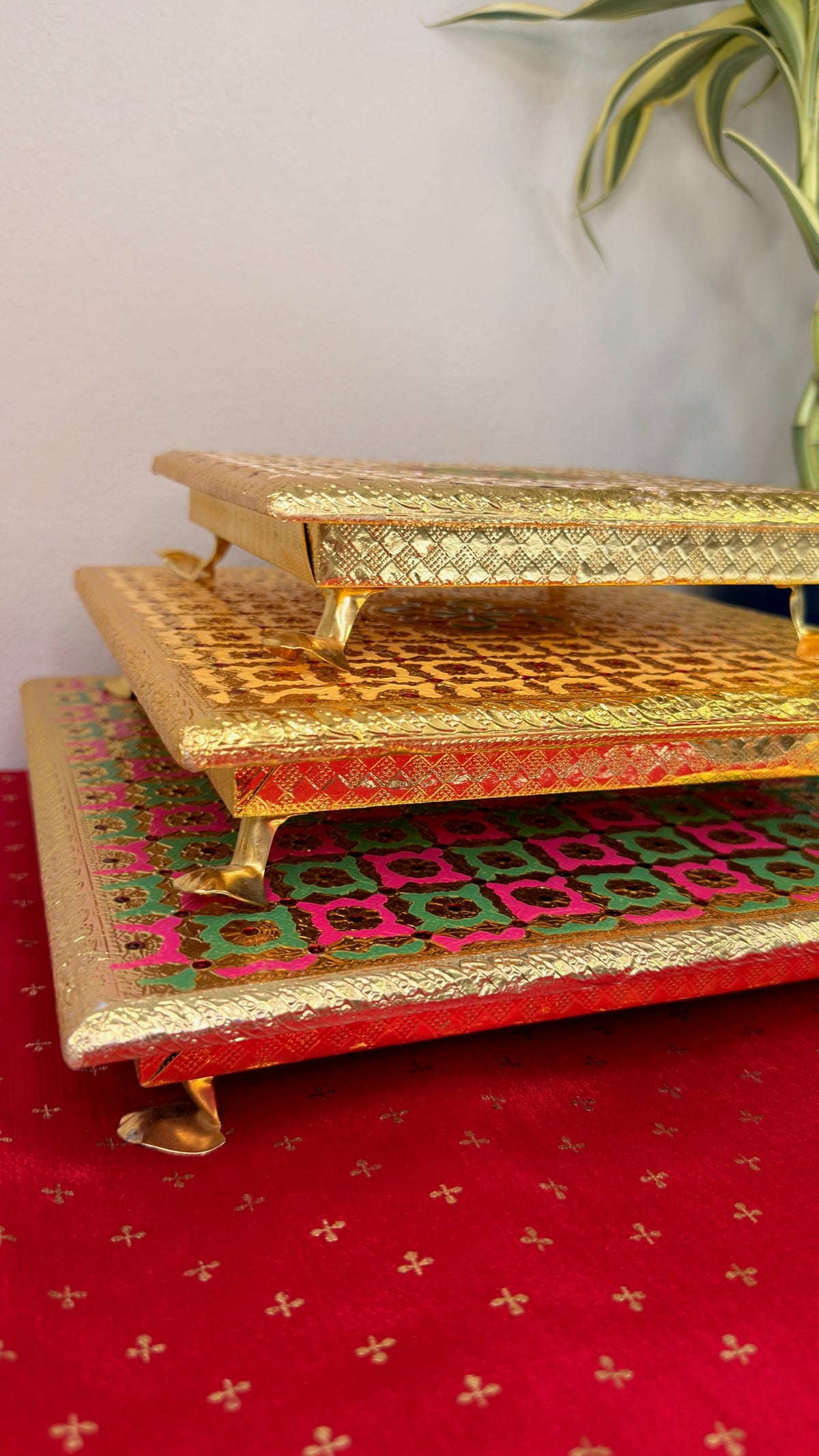 Stacked brocade puja chowkis for Diwali and Ganesh Chaturthi, front view