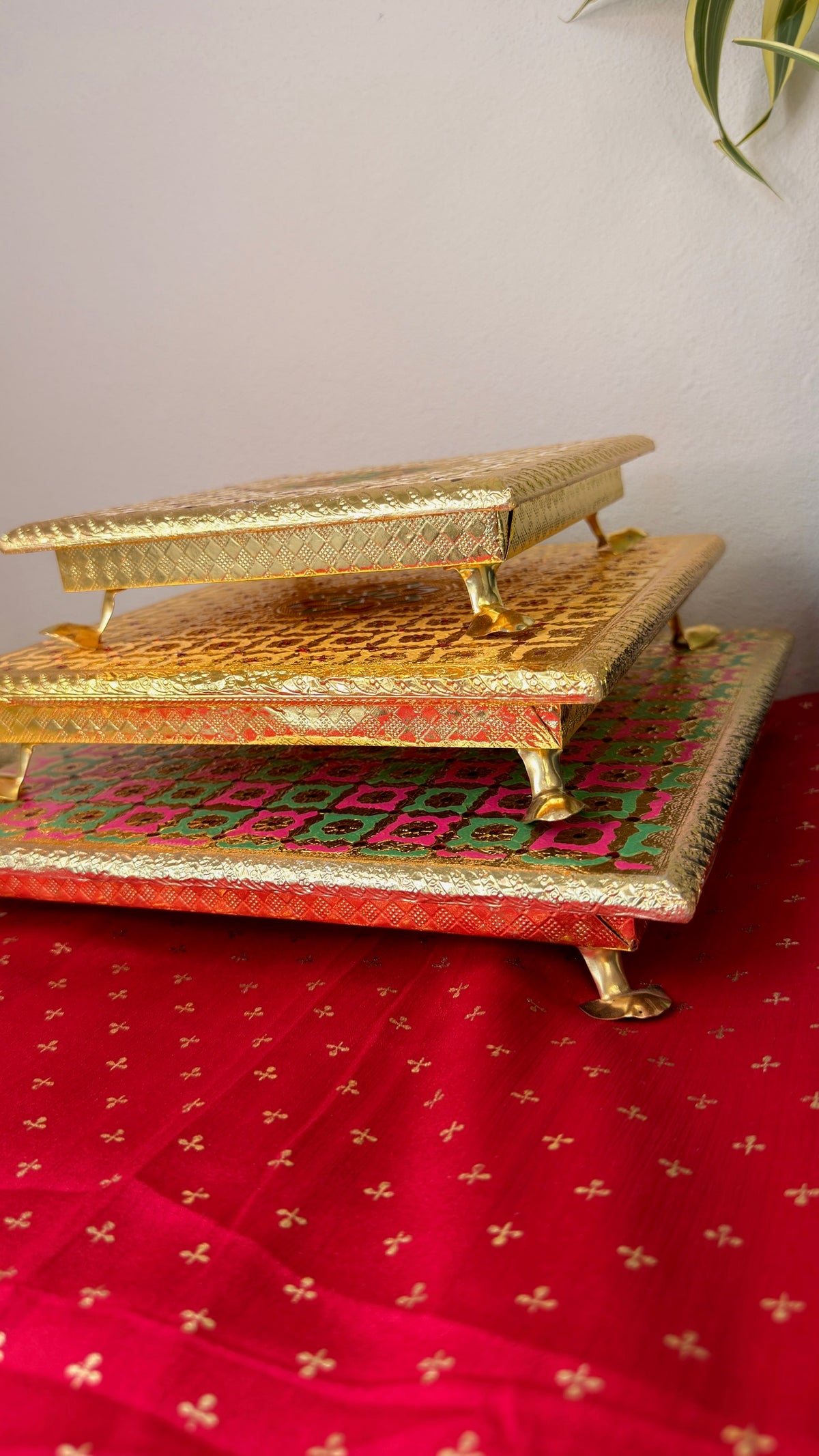 Stackable brocade puja chowki set in gold, maroon dot and pink green, 8 10 and 12 inch bajots